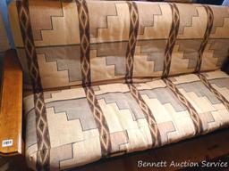 Wood framed futon is about 7" x 3" x 3' tall when set up as a couch. Whole piece look to be in nice