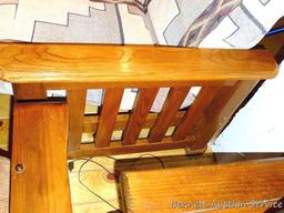 Wood framed futon is about 7" x 3" x 3' tall when set up as a couch. Whole piece look to be in nice