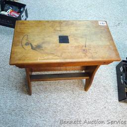 Wooden side table is very sturdy, has a book rack underneath and in good condition. 21" x 22" high x