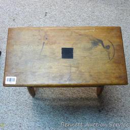 Wooden side table is very sturdy, has a book rack underneath and in good condition. 21" x 22" high x