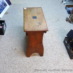Wooden side table is very sturdy, has a book rack underneath and in good condition. 21" x 22" high x