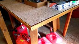 Work table is about 49" x 55" x 34" high overall. Has two circular cutouts for some special purpose.