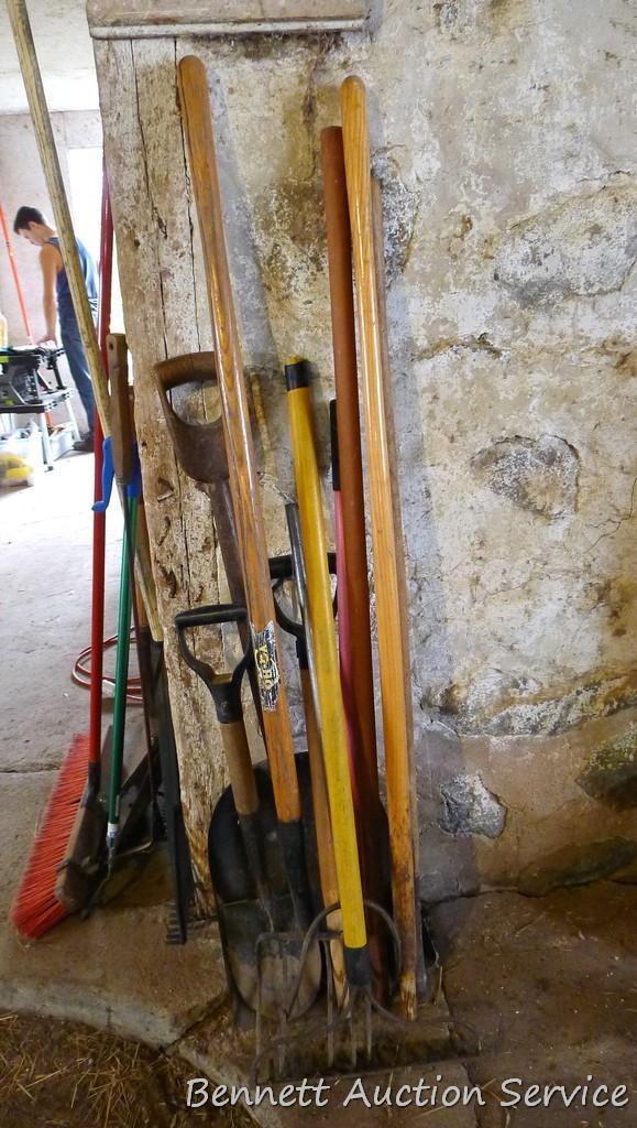 Five misc. handles; scoop shovel with wooden handle; cute 27" spade shovel; rake and more.