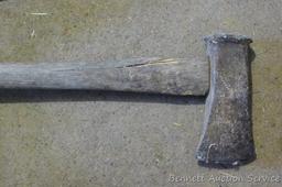 Splitting maul has 3-1/4" x 7" head, handle is cracked; 12 lb. sledge hammer made in USA.