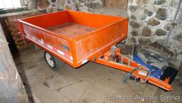 Large utility trailer with hand pump hydraulic dump is of all steel construction. Box is 53" x 74" x