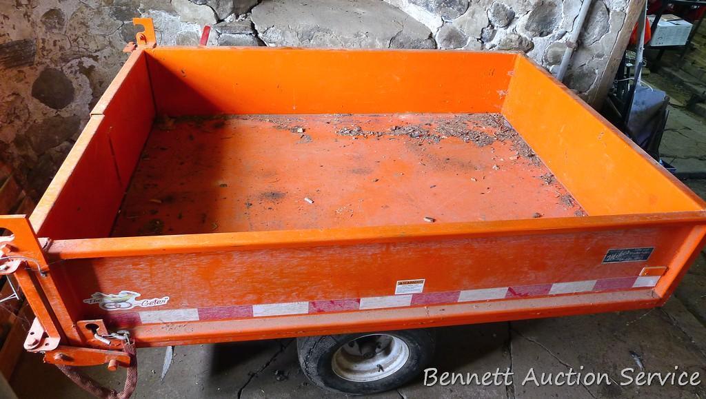 Large utility trailer with hand pump hydraulic dump is of all steel construction. Box is 53" x 74" x