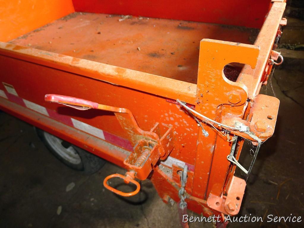 Large utility trailer with hand pump hydraulic dump is of all steel construction. Box is 53" x 74" x