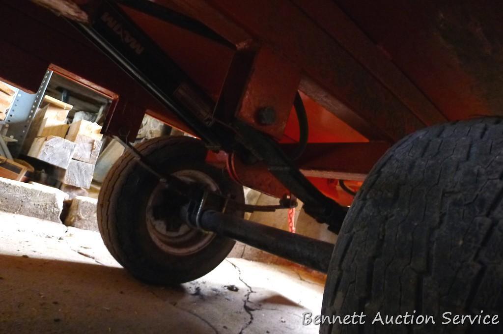 Large utility trailer with hand pump hydraulic dump is of all steel construction. Box is 53" x 74" x