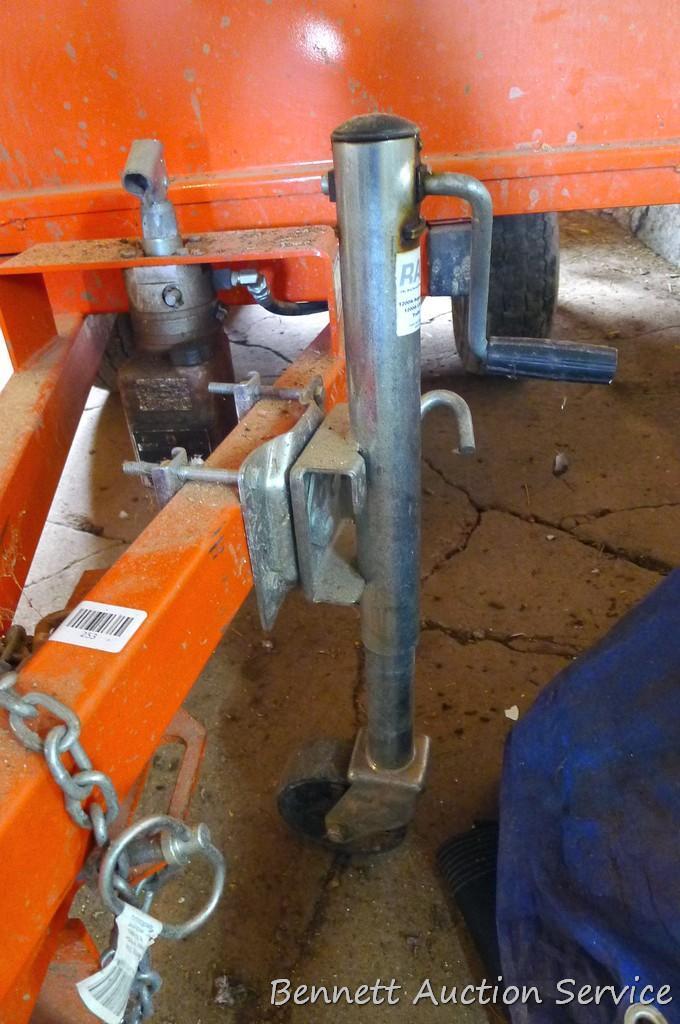 Large utility trailer with hand pump hydraulic dump is of all steel construction. Box is 53" x 74" x