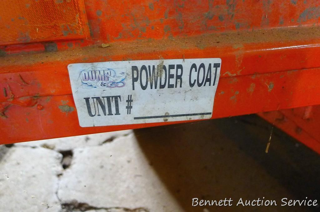 Large utility trailer with hand pump hydraulic dump is of all steel construction. Box is 53" x 74" x