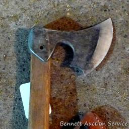 Unique hatchet is 18" long with 4" x 5-1/2" blade and leather sheath.
