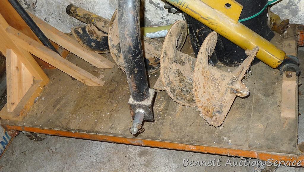 3 point post hole auger attachment. Auger section is nearly 4'. 12" diameter. Has category 2 hitch