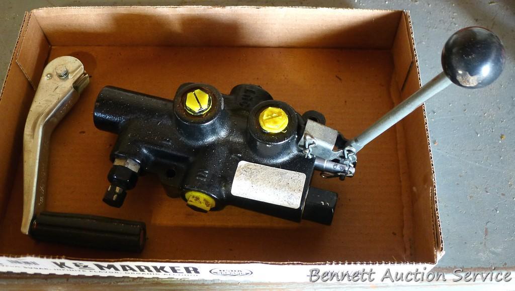 Hydraulic cylinder valve assembly; handle for a jack.