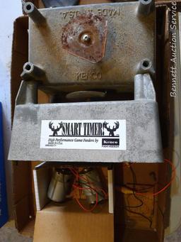 Two Kenco Smart Timer game feeders and motors. Each is 5-1/2" x 8-1/2" x 5".