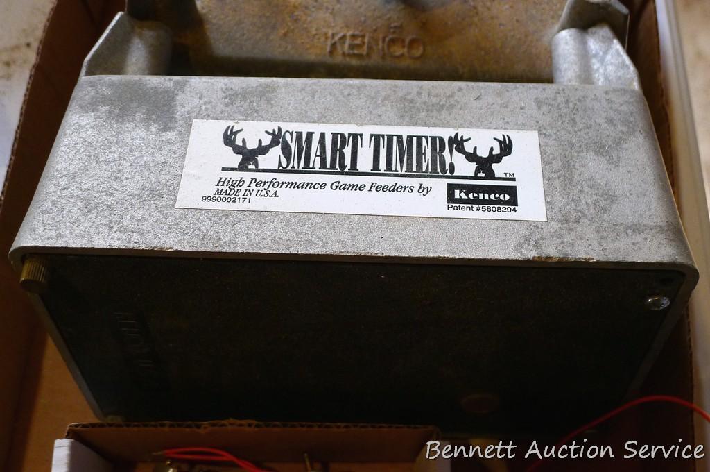Two Kenco Smart Timer game feeders and motors. Each is 5-1/2" x 8-1/2" x 5".