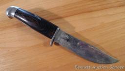 Northwest Territory knife is 8-1/2" long. Comes in leather sheath.