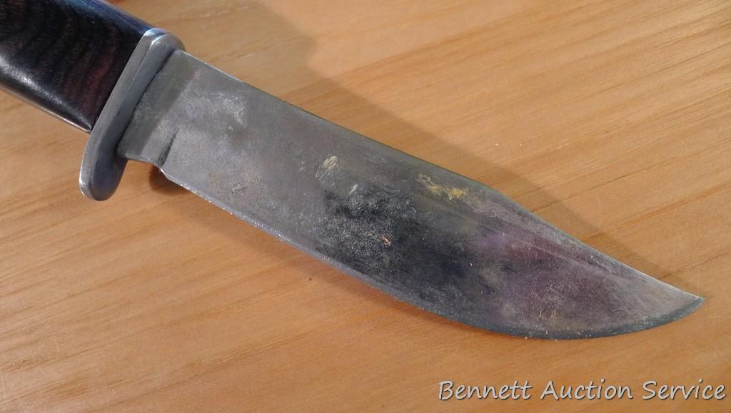 Northwest Territory knife is 8-1/2" long. Comes in leather sheath.