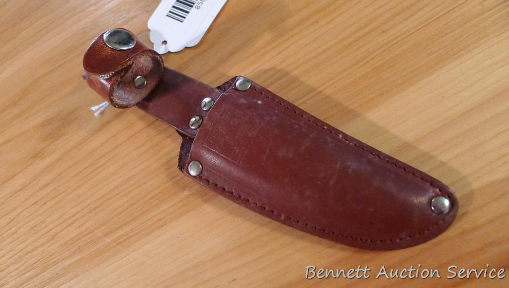 Northwest Territory knife is 8-1/2" long. Comes in leather sheath.