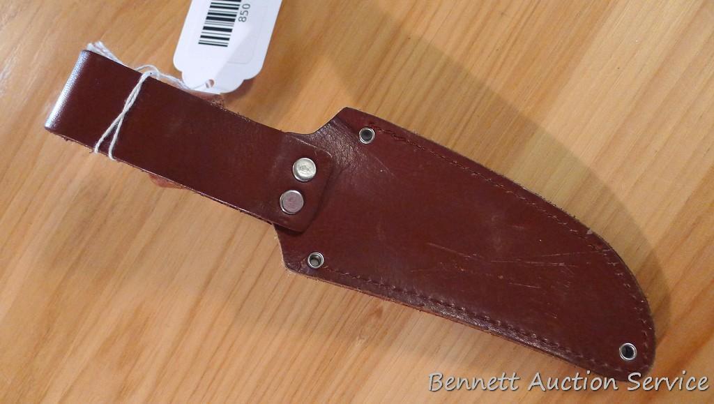 Northwest Territory knife is 8-1/2" long. Comes in leather sheath.