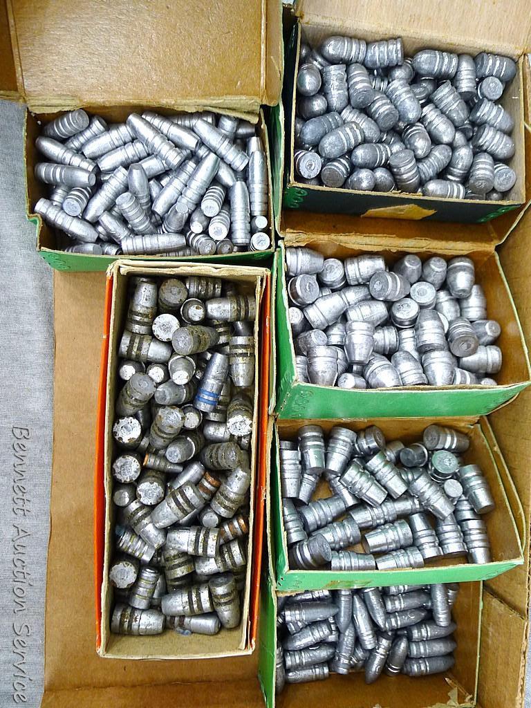 Assorted cast lead bullets including round nose, flat cone nose, Spitzer, capped base, more.