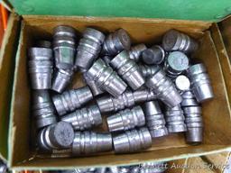 Assorted cast lead bullets including round nose, flat cone nose, Spitzer, capped base, more.