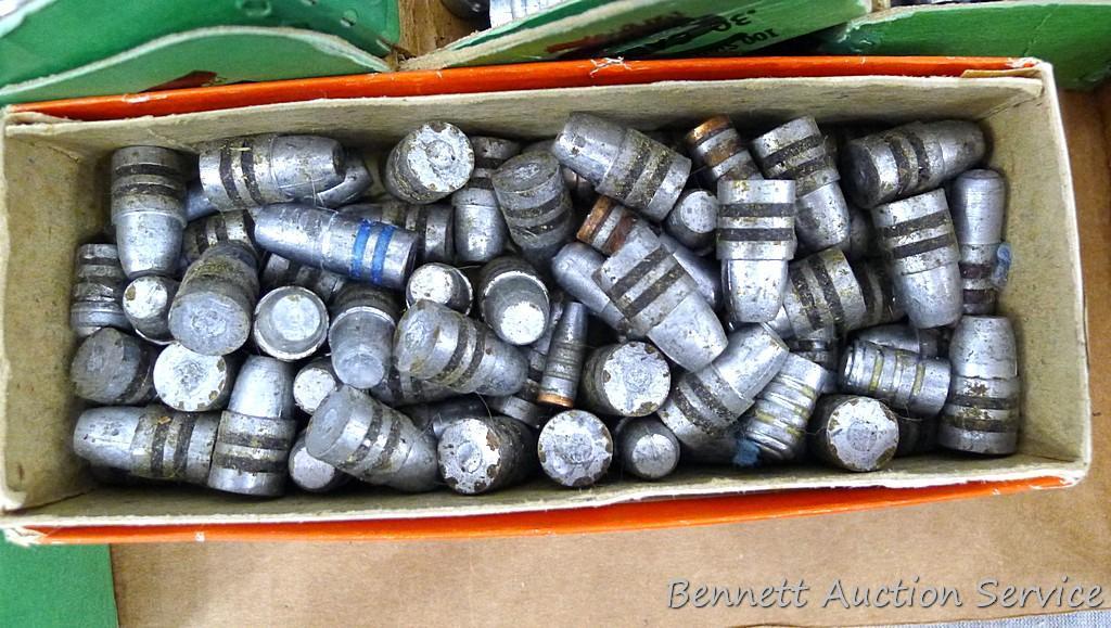 Assorted cast lead bullets including round nose, flat cone nose, Spitzer, capped base, more.