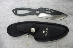 Buck Knife 143C PakLite Large Skinner Skeletonized Knife 141 Black Oxide with canvas sheath. Has a
