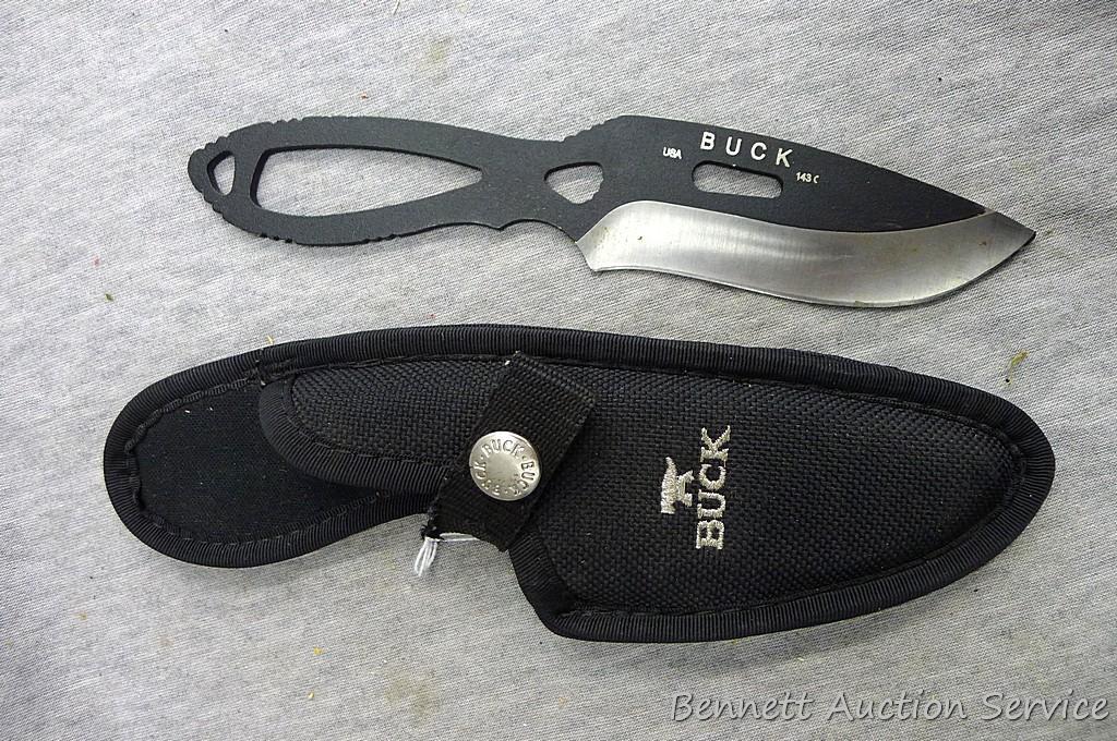 Buck Knife 143C PakLite Large Skinner Skeletonized Knife 141 Black Oxide with canvas sheath. Has a