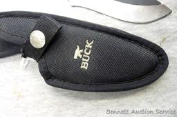 Buck Knife 143C PakLite Large Skinner Skeletonized Knife 141 Black Oxide with canvas sheath. Has a