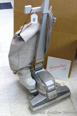 Generation 3 by Kirby vacuum; 15" x 16" x 43". Vacuum does not turn on, but could be an easy repair