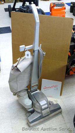 Generation 3 by Kirby vacuum; 15" x 16" x 43". Vacuum does not turn on, but could be an easy repair