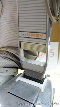 Generation 3 by Kirby vacuum; 15" x 16" x 43". Vacuum does not turn on, but could be an easy repair