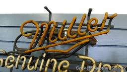 No shipping; Miller Genuine Draft neon sign; measures 24" x 19". Tubes seem to be intact; does