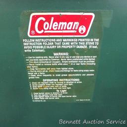 Coleman camp stove is about 21" x 13" x 4". Looks to be in pretty good condition and includes