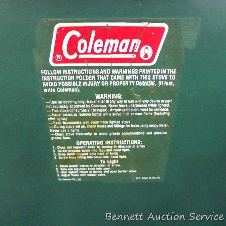 Coleman camp stove is about 21" x 13" x 4". Looks to be in pretty good condition and includes
