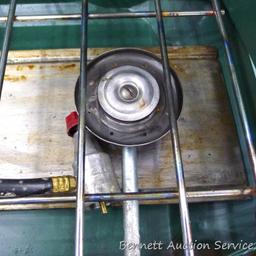 Coleman camp stove is about 21" x 13" x 4". Looks to be in pretty good condition and includes