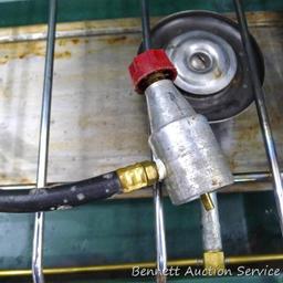 Coleman camp stove is about 21" x 13" x 4". Looks to be in pretty good condition and includes