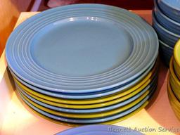 Gibson dinnerware in pretty teal and green colors. Pieces include eight 10-1/2" dinner plates, seven
