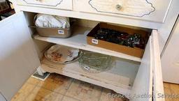 Very charming cabinet with glass doors on top, the drawers and paneled doors have a pressed design