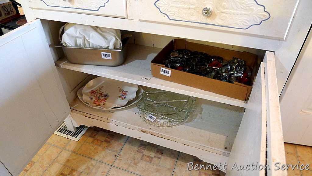 Very charming cabinet with glass doors on top, the drawers and paneled doors have a pressed design