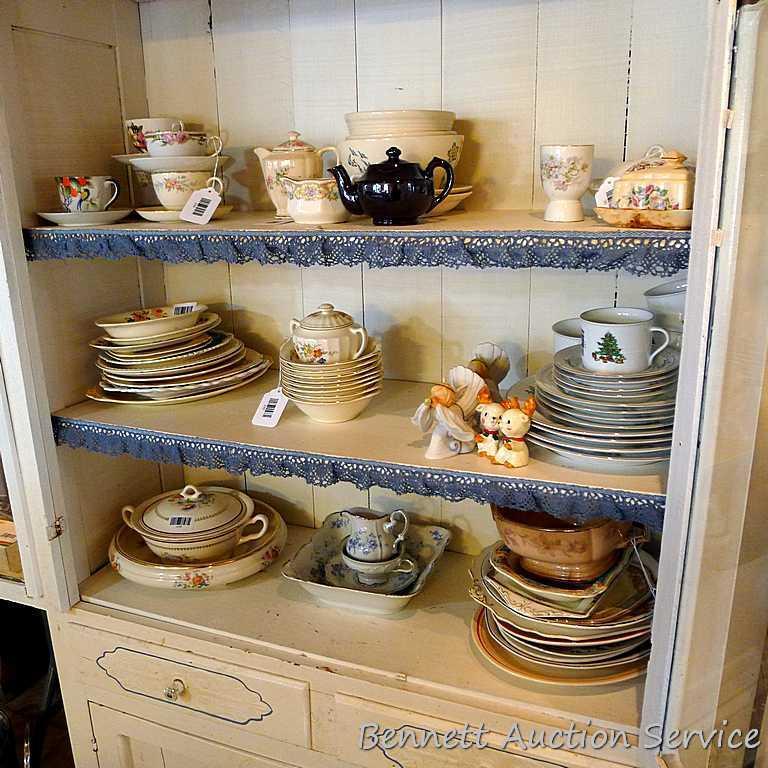Very charming cabinet with glass doors on top, the drawers and paneled doors have a pressed design