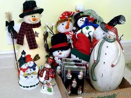 Variety of snowmen ornaments and decorations. Smallest Christmas ornaments are each approx. 2",