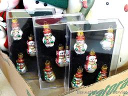 Variety of snowmen ornaments and decorations. Smallest Christmas ornaments are each approx. 2",