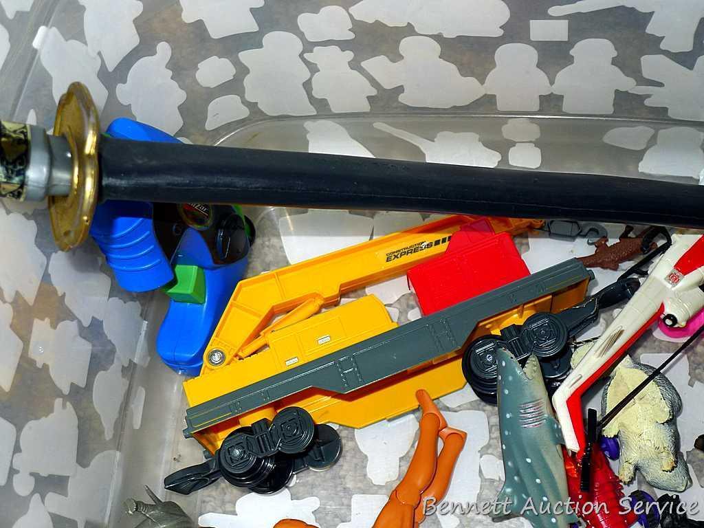Tub of toys includes some K'Nex; Nerf rifle; set of 4 water Blasters; ceramic military dressed piggy
