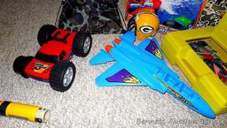 Tub of toys includes some K'Nex; Nerf rifle; set of 4 water Blasters; ceramic military dressed piggy