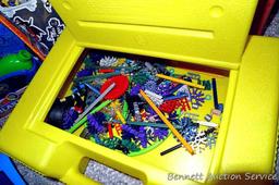 Tub of toys includes some K'Nex; Nerf rifle; set of 4 water Blasters; ceramic military dressed piggy