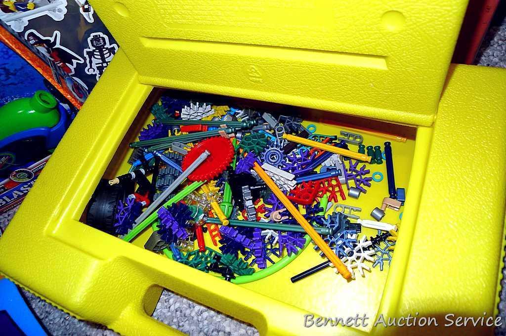 Tub of toys includes some K'Nex; Nerf rifle; set of 4 water Blasters; ceramic military dressed piggy