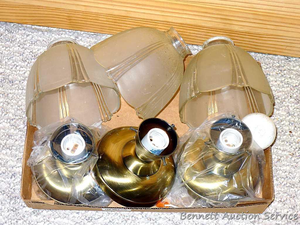 Three ceiling light fixtures with glass globes 5-1/4" x 6".