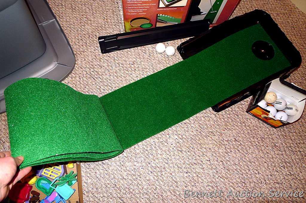 Club Champ Automatic Putting System for indoor practice and a box full of golf balls.