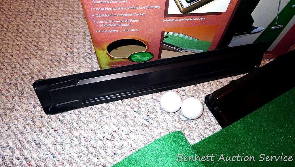 Club Champ Automatic Putting System for indoor practice and a box full of golf balls.